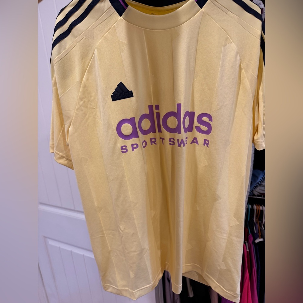 Two Adidas Men's Yellow and Purple Sports Jerseys. Brand new with tag.